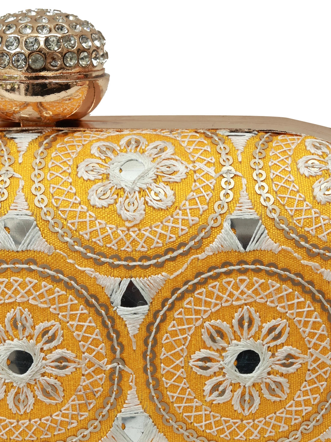 Yellow oval clutch bag by The Tan Clan with a sleek design and compact shape, perfect for evening or special occasions.