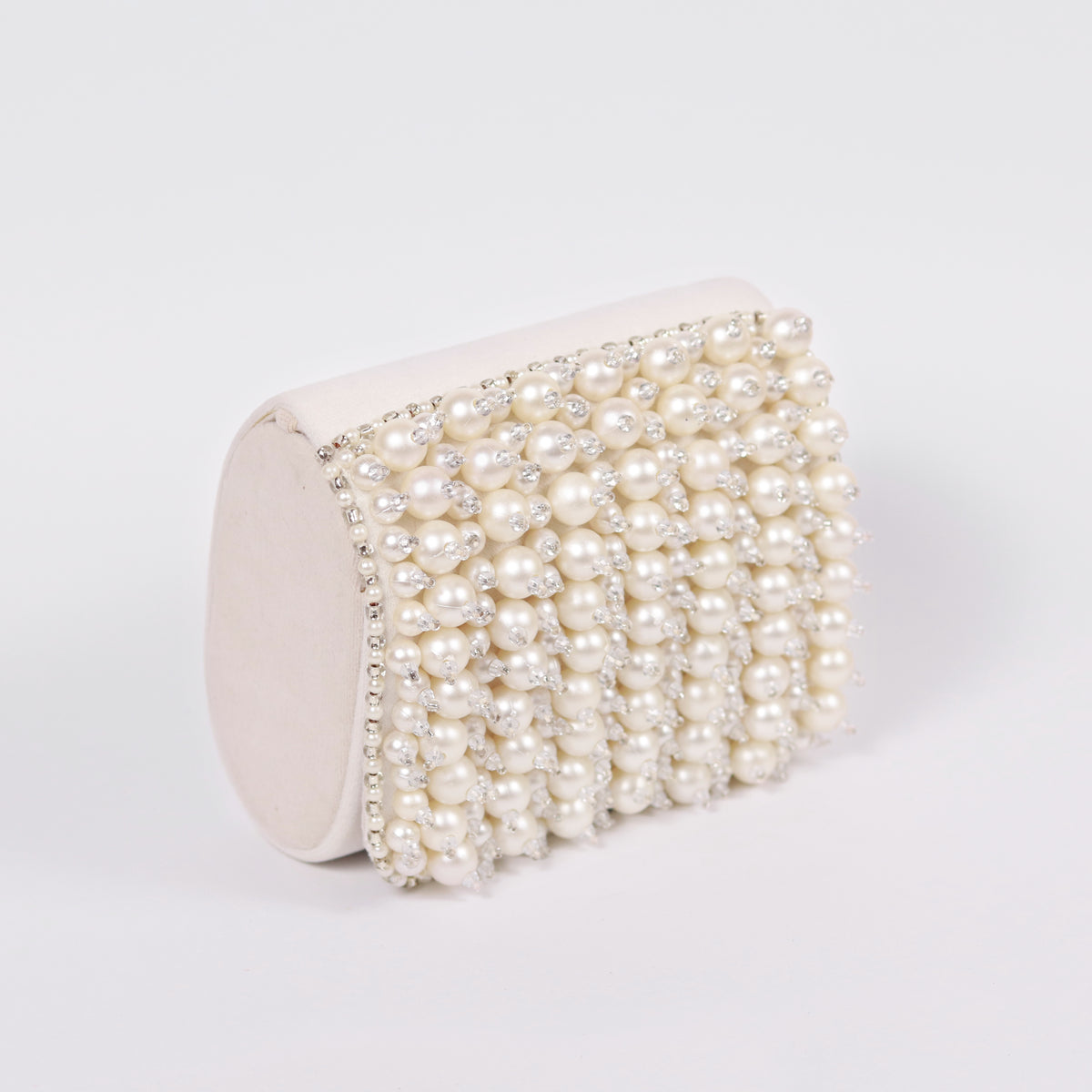 Jade mini bag by The Tan Clan with embroidered handle and sleek design, perfect for stylish accessories and everyday use.
