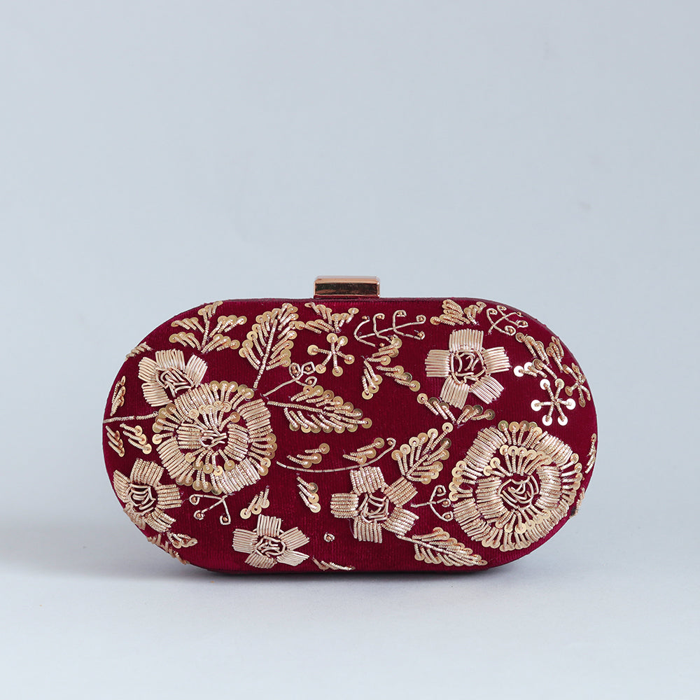 Begum Zardozi hand-embroidered clutch bag with intricate gold threadwork and embellishments, crafted by The Tan Clan.