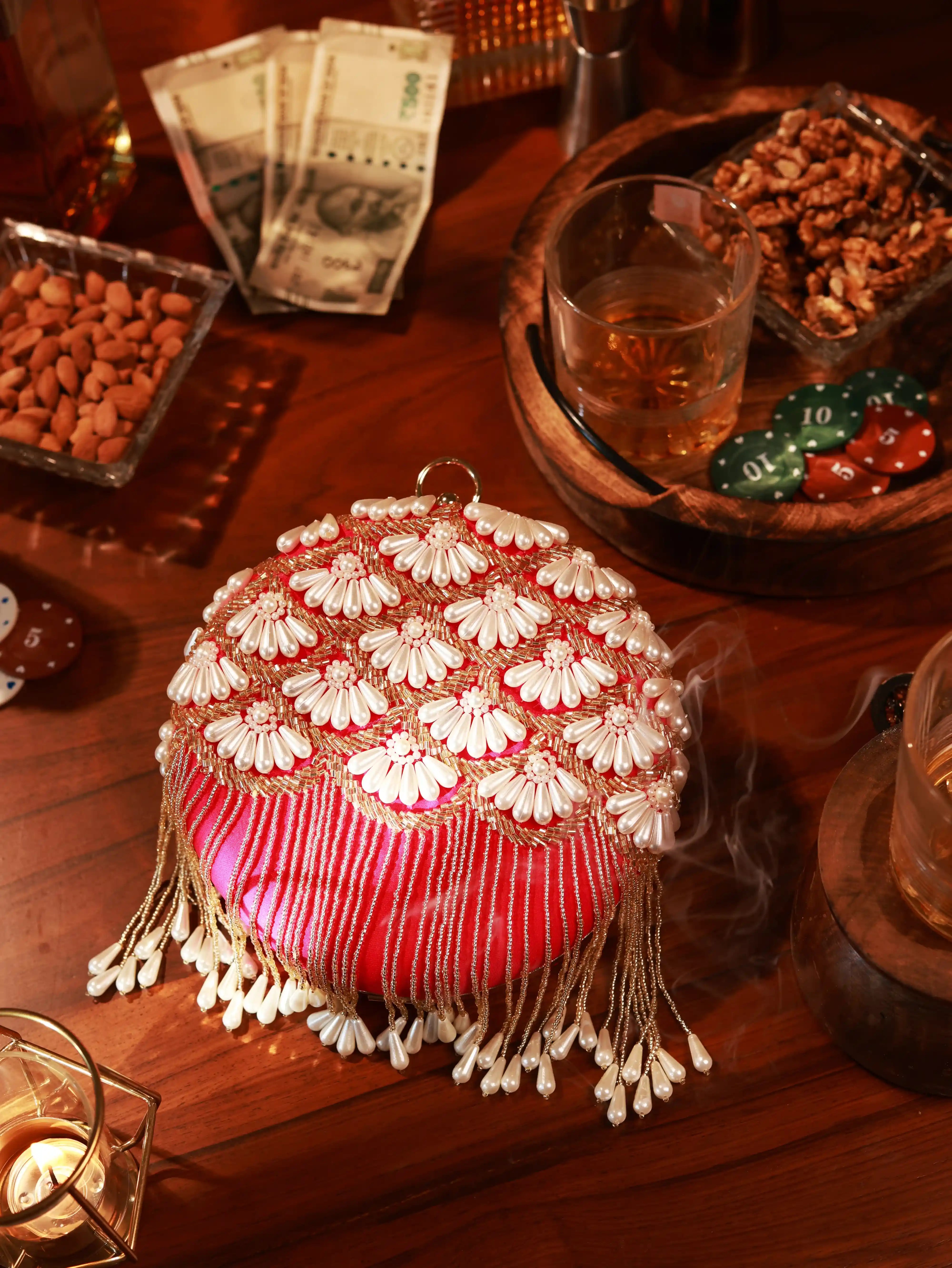 Irsa Round Hand Embroidered Clutch with Tassles