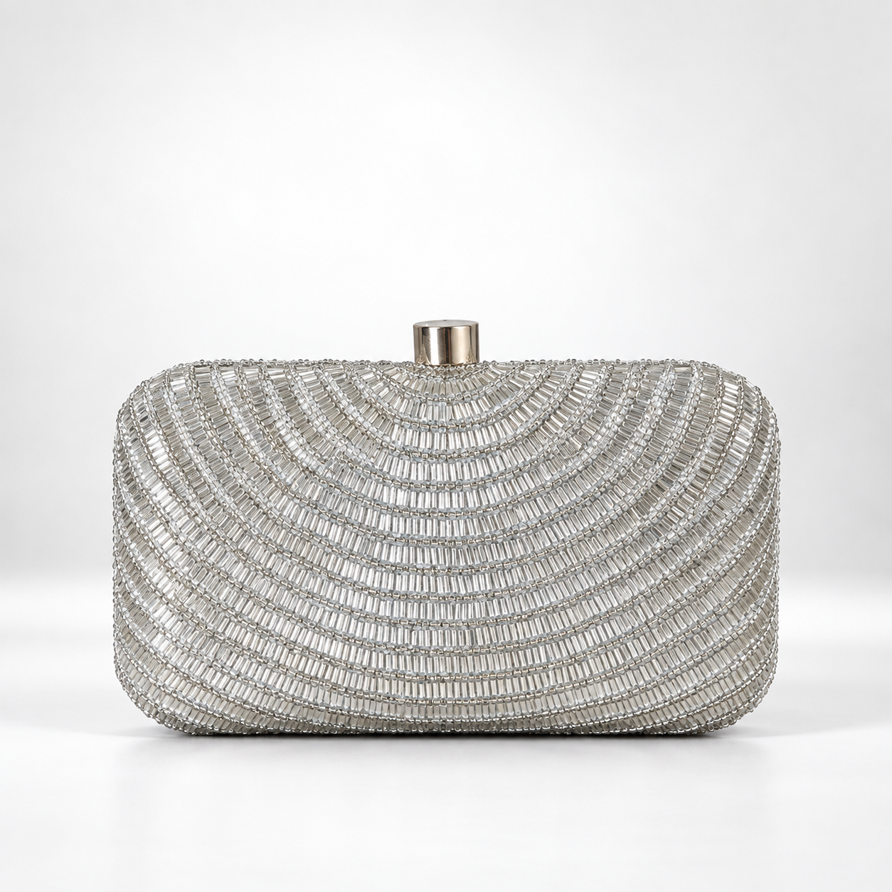 Silver hand-embroidered party clutch bag with glittering accents by Glitz, designed for elegant evening events.