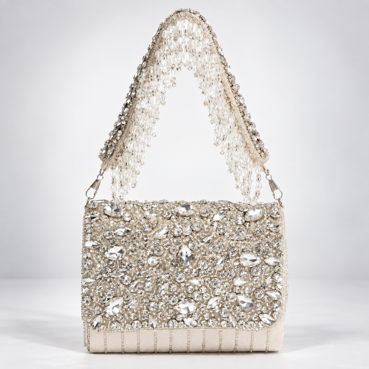 Grace Embellished Flap Over Bag from The Tan Clan, featuring decorative embellishments and a stylish flap closure.