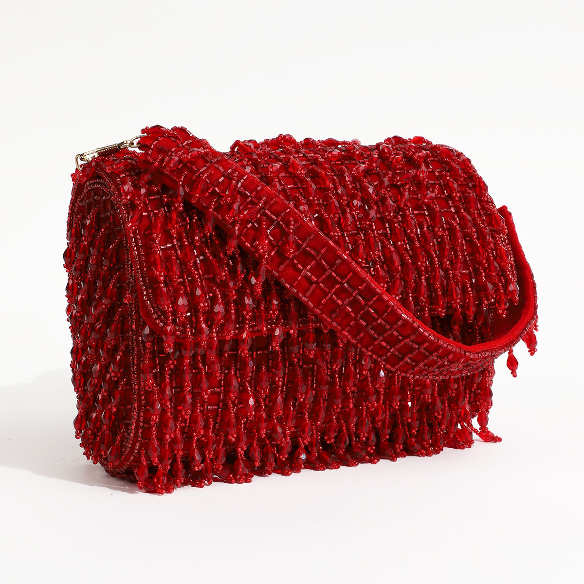 Rosa beaded flap over clutch bag by The Tan Clan with intricate beadwork and a vibrant red color, stylish evening accessory.