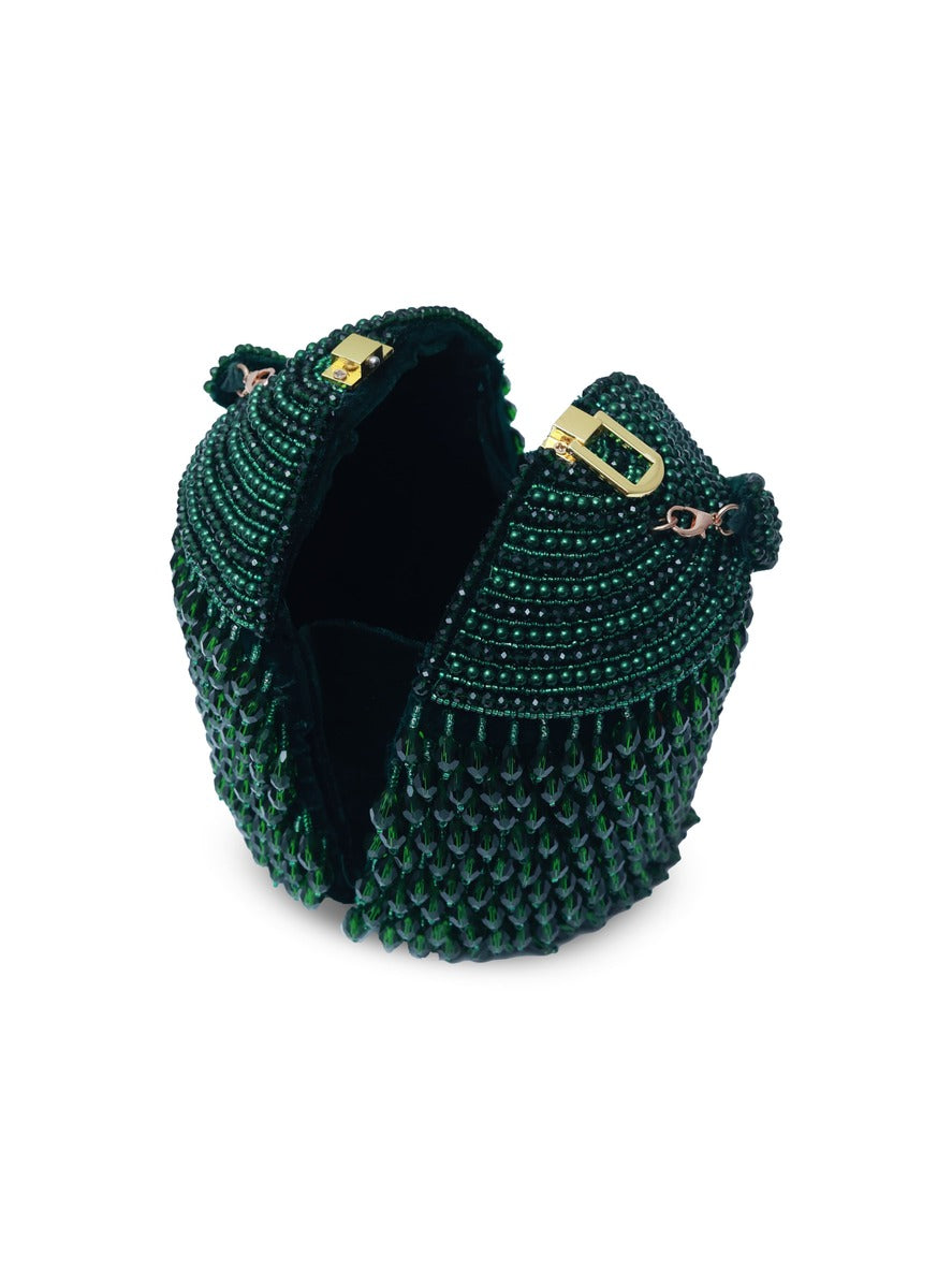 Emma round embellished bag with handle by The Tan Clan, featuring intricate beadwork and a sleek, rounded design.