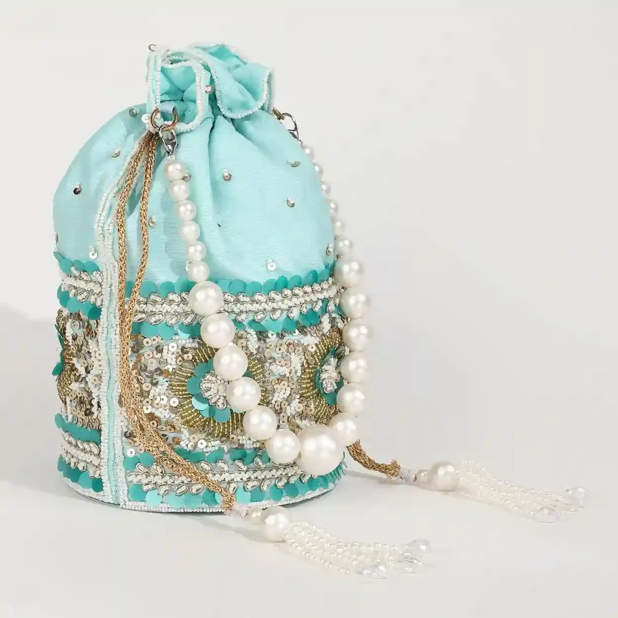 Ama Potli Bag with pearl handle by The Tan Clan, featuring intricate embroidery and elegant design for traditional occasions.