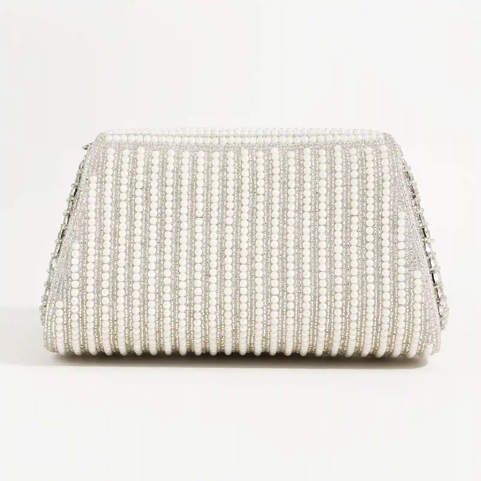 Chloe flap-over bag with handle by The Tan Clan, featuring a stylish design and secure flap closure in a versatile style.