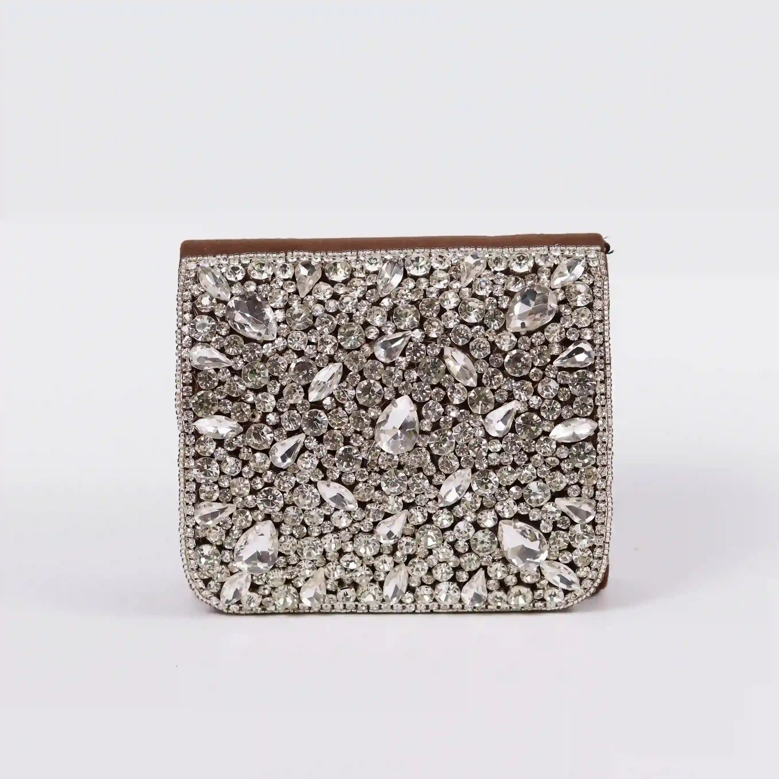 Brown Grace Mini Bag by The Tan Clan with embroidered handle and sleek design, perfect for stylish everyday use.
