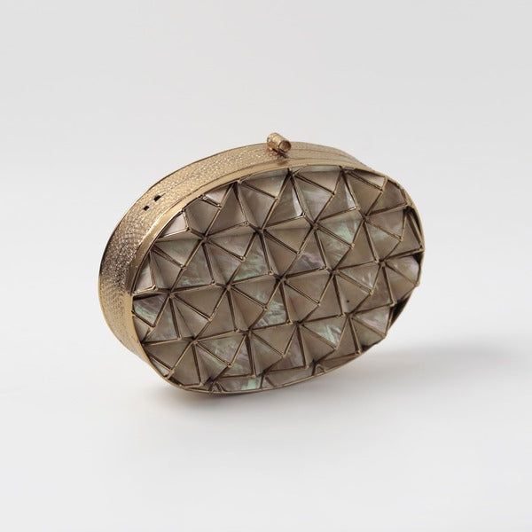 Maya 3D Mother of Pearl clutch by The Tan Clan featuring iridescent pearl design and elegant rectangular shape.