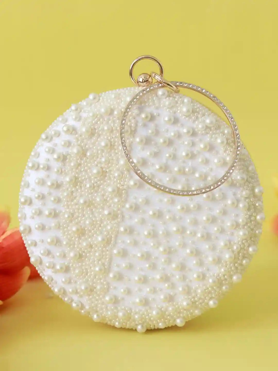Mukta All White Pearl Hand Embroidered Clutch by The Tan Clan, featuring intricate pearl embroidery on elegant white fabric.