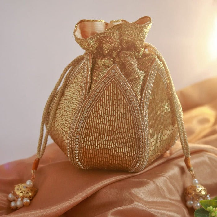 Set of three modern bride essentials from THE TAN CLAN, featuring stylish accessories and tools for bridal preparations.