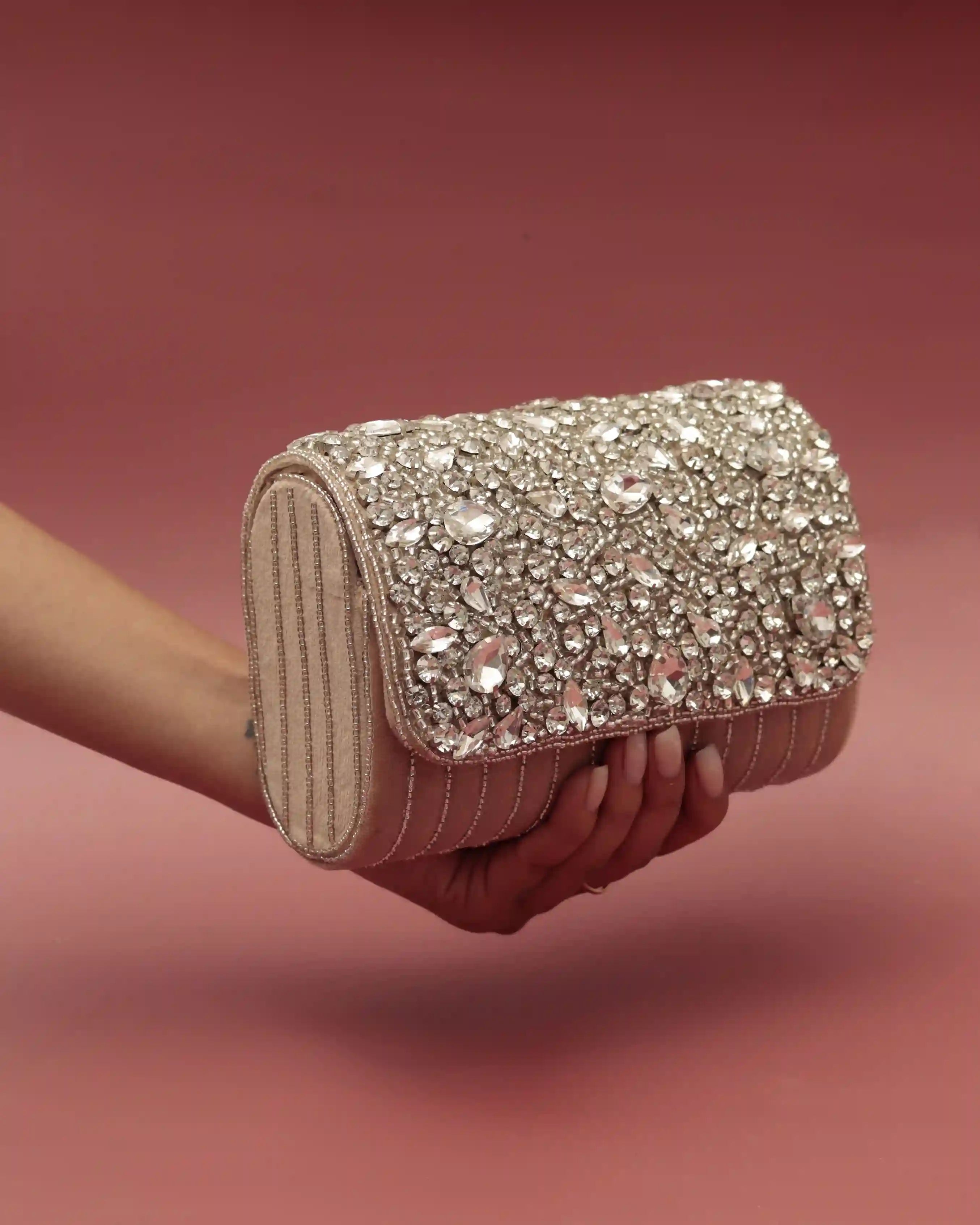 Elegant beige flap bag and silver clutch from THE TAN CLAN's Glitz Grace Combo set, featuring stylish, matching accessories.