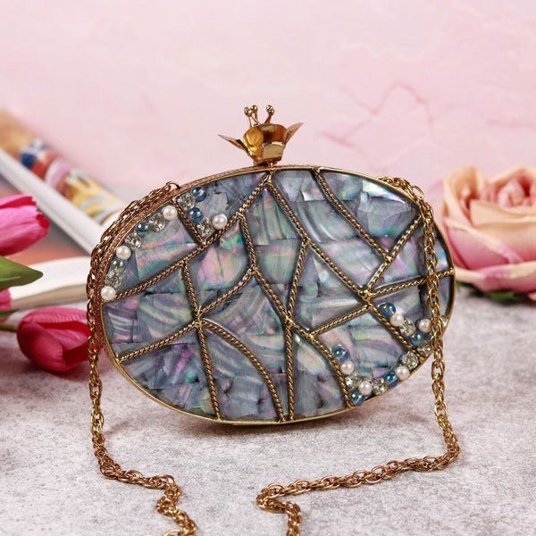 Nargis embellished mother of pearl clutch by The Tan Clan with intricate beadwork and elegant design, showcasing a sophisticated accessory.