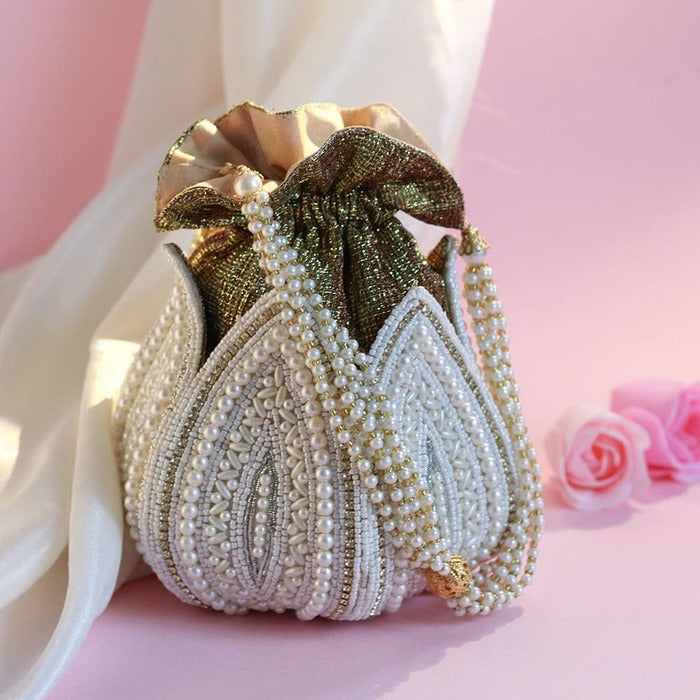 Shravana Lotus Potli Bag and Amour Batua Bag by THE TAN CLAN, traditional embroidered accessories for festive occasions.