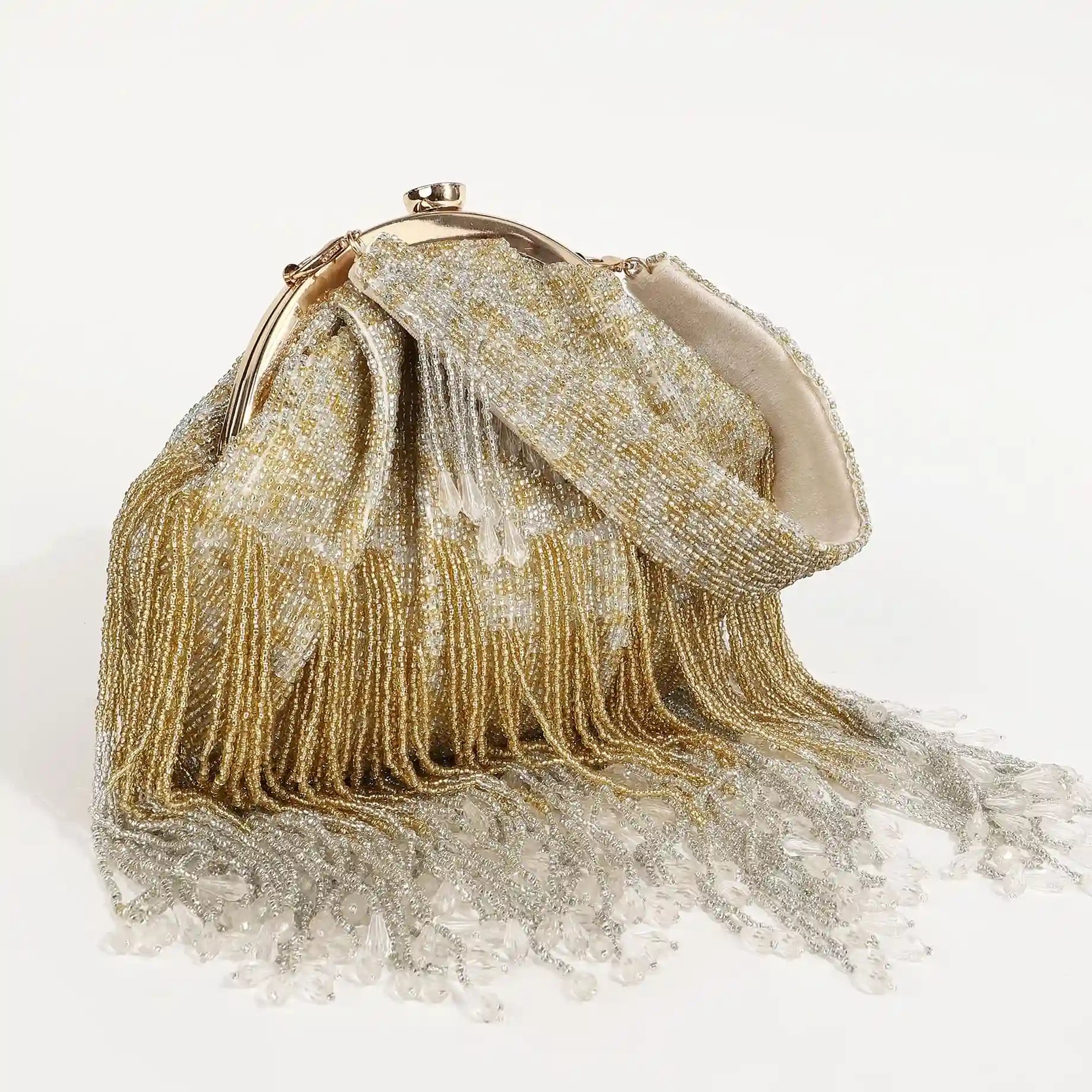 Amour Batua bag with detachable handle by The Tan Clan, featuring traditional design and intricate detailing.