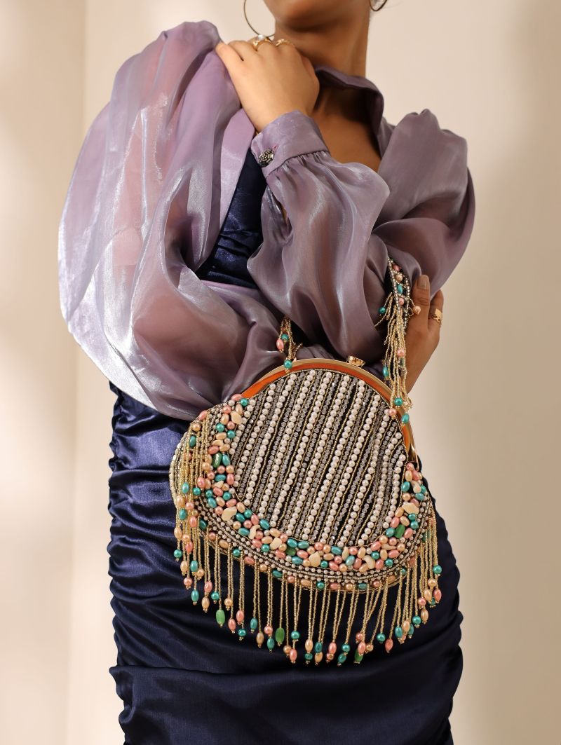 Black Sona Pearl Tasselled Batua with detachable handle by The Tan Clan, featuring intricate pearl tassel details and traditional design.