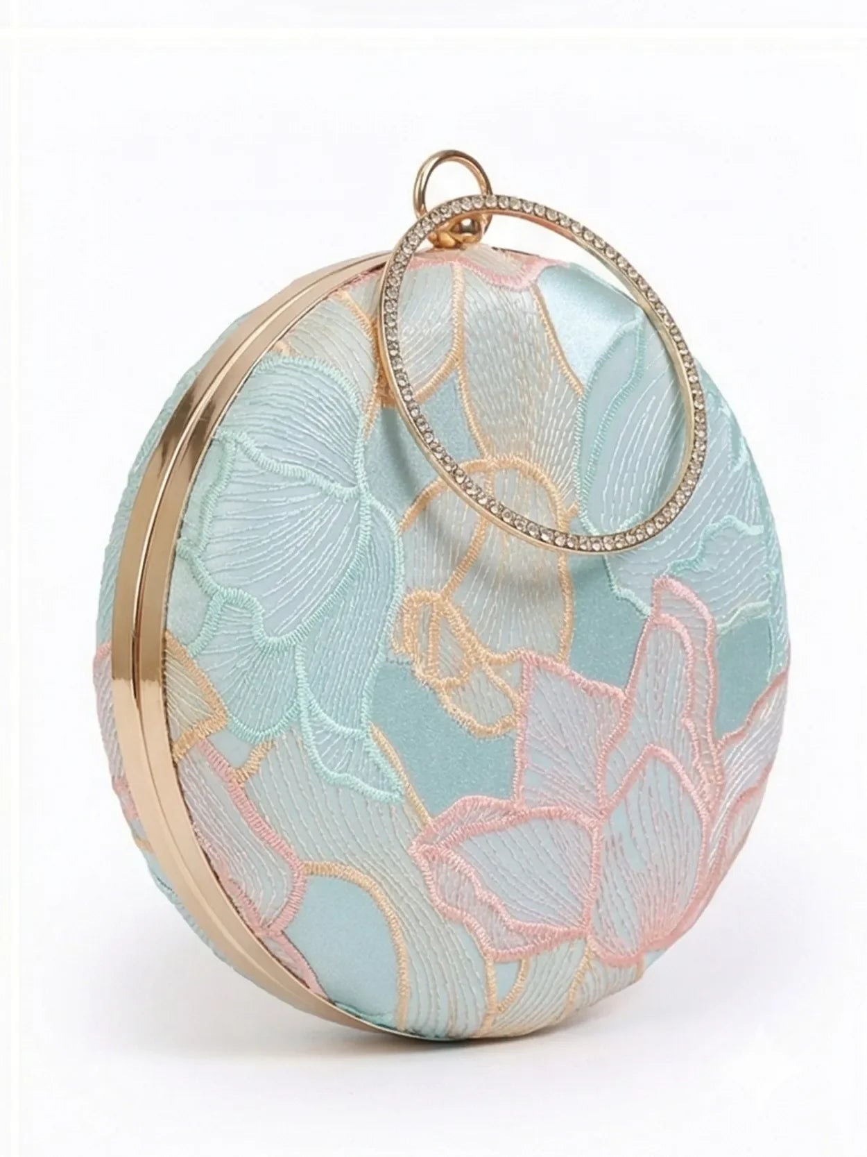 Tide Blue round clutch bag by The Tan Clan with a smooth, glossy finish and minimalist design, perfect for stylish evening accessories.