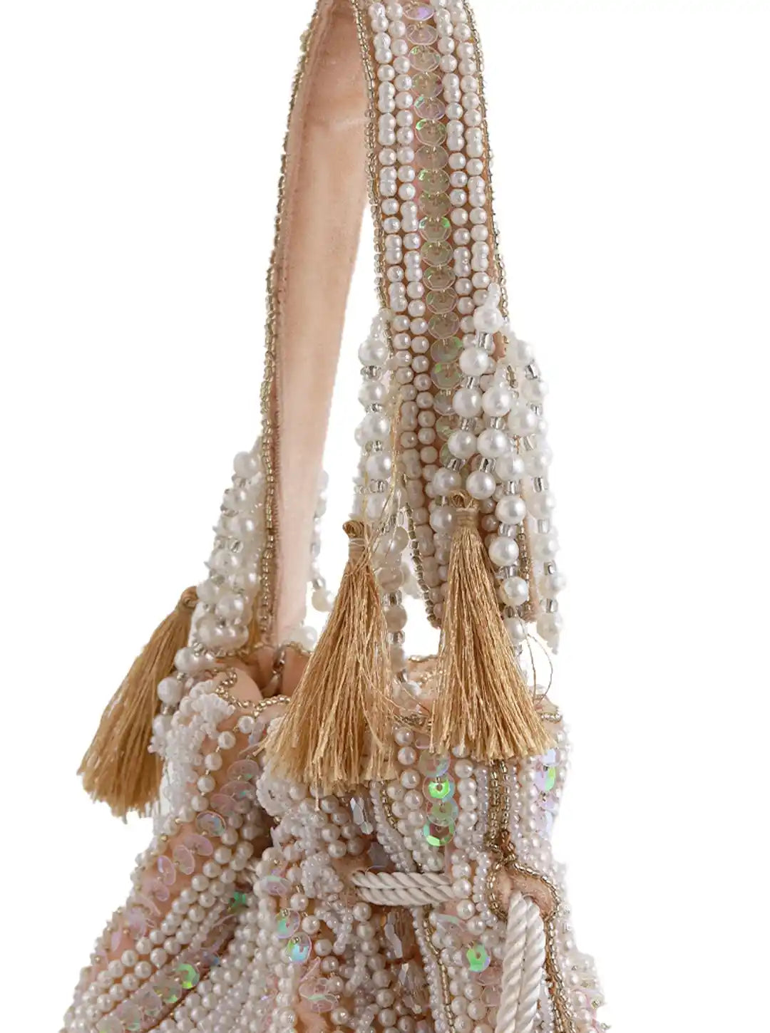 Beige tasselled potli bag by The Tan Clan, stylish accessory with decorative tassels, perfect for weddings and special occasions.