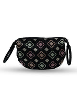 Black Luna Half Moon Bag by The Tan Clan, sleek batua bag with curved design and adjustable strap, displayed on a neutral background.