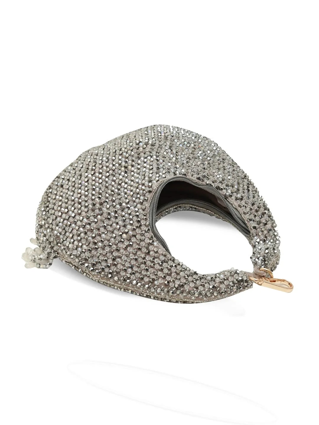 Silver beaded handbag on a white background