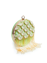 Irsa round hand-embroidered clutch with tassels by The Tan Clan, featuring intricate embroidery and a stylish compact design.