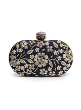 Hand-embroidered Baiza Zardozi clutch bag by The Tan Clan featuring intricate traditional embroidery and a sleek design.