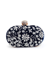 Hand-embroidered Baiza Zardozi clutch bag with intricate embroidery by The Tan Clan, featuring traditional craftsmanship and vibrant design.