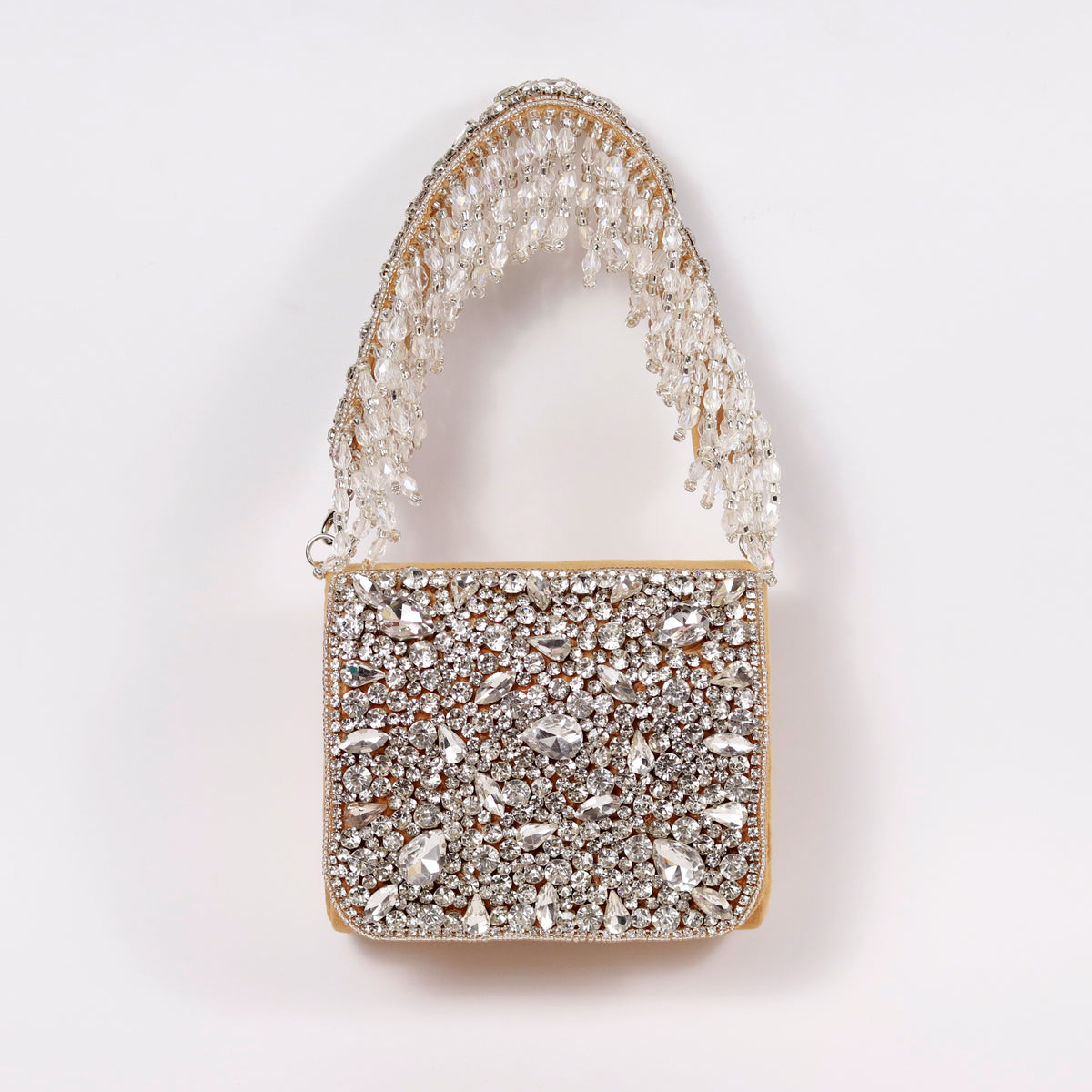 The Tan Clan Grace Mini Bag with embroidered handle, featuring a stylish compact design and intricate stitching details.