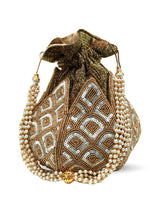 Yana Lotus Potli bag by The Tan Clan featuring pearl handle and intricate lotus design, perfect for elegant occasions.