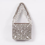 Grace mini bag by The Tan Clan featuring an embroidered handle, small handbag with detailed embroidery on the strap.