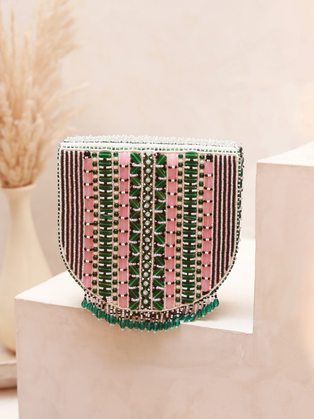 Asma Green Flap Over Bag with Handle by The Tan Clan, featuring a sleek flap closure and sturdy carrying handle.