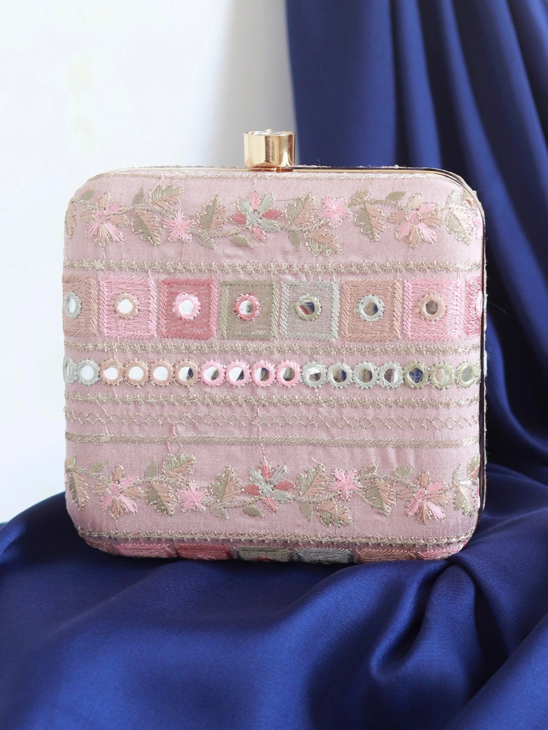 Phulwaari floral box clutch by The Tan Clan showcasing intricate embroidered floral patterns on a compact accessory.