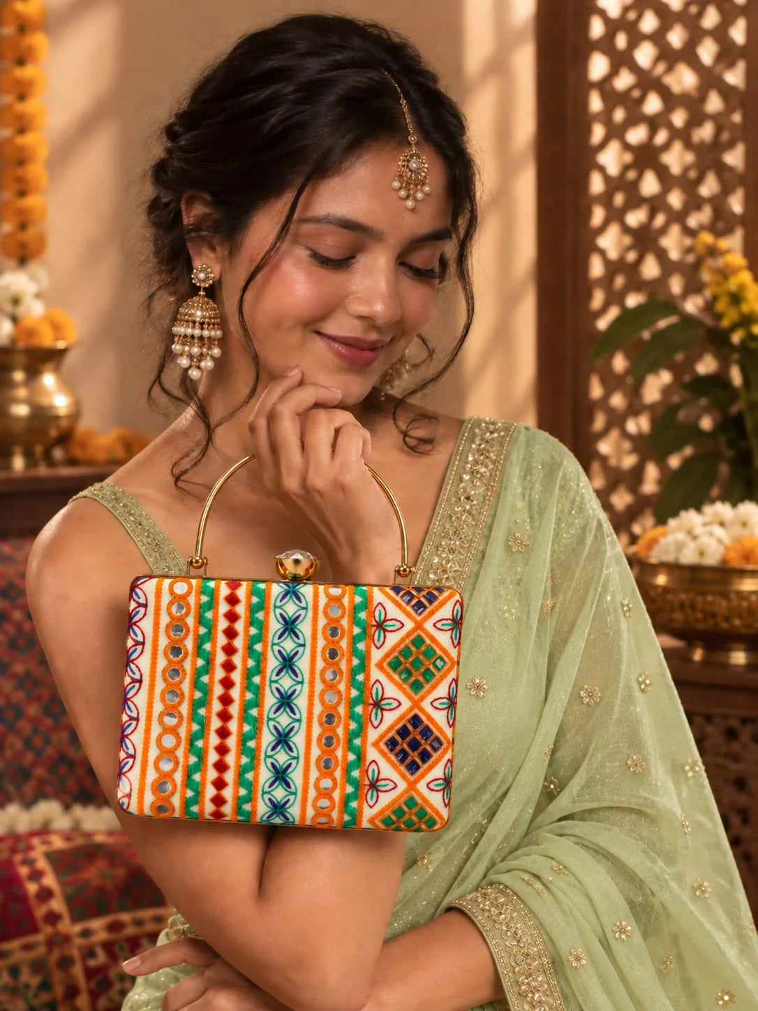 Multicolor Satrang casket clutch bag by THE TAN CLAN featuring intricate patterns and compact design for elegant occasions.