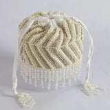 Petite embroidered mini potli bag with glass bead hangings by The Tan Clan, featuring intricate embroidery and decorative embellishments.