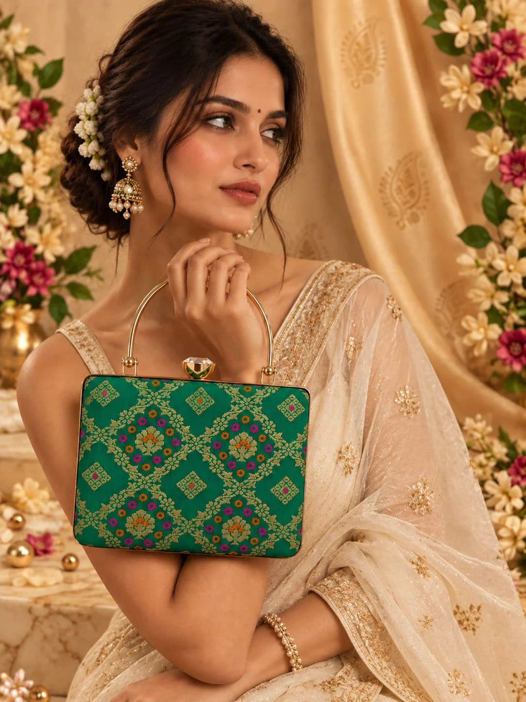 Light green Mahi casket clutch by THE TAN CLAN featuring a sleek rectangular design with a subtle sheen and elegant clasp.