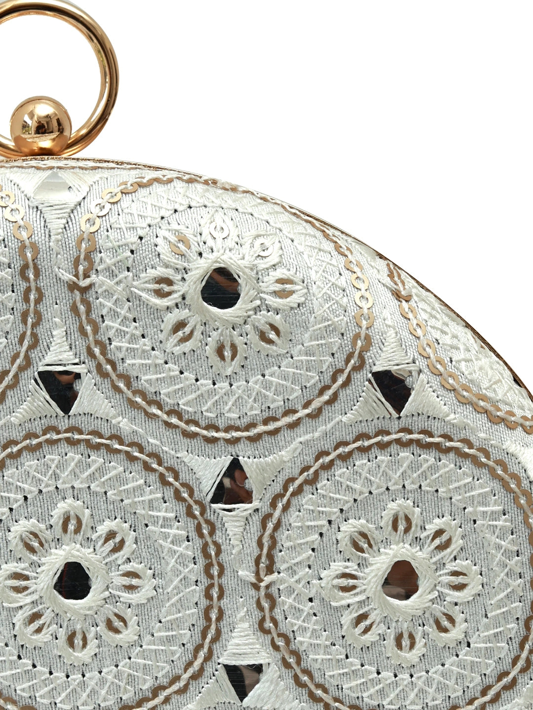 White round clutch bag from The Tan Clan's Inaara collection, featuring a sleek and elegant design with a smooth finish.