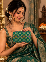 Light green box clutch by THE TAN CLAN featuring a sleek design and compact size for elegant occasions.