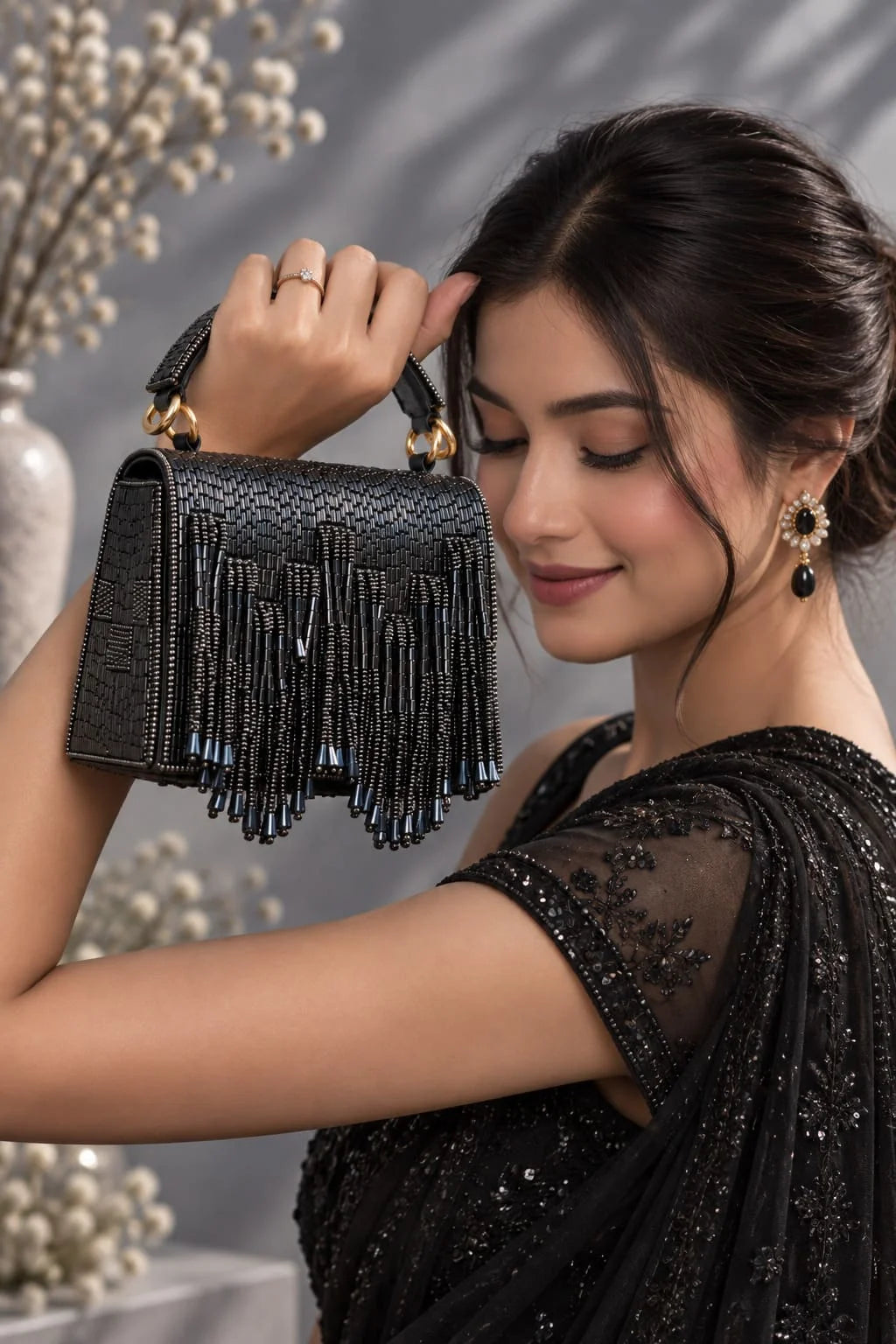 Maria Blue handcrafted beaded tasselled bag by THE TAN CLAN, featuring intricate beadwork and a stylish tassel detail.