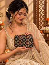 Mahi Black Box Clutch by THE TAN CLAN featuring sleek rectangular design and minimalist style.