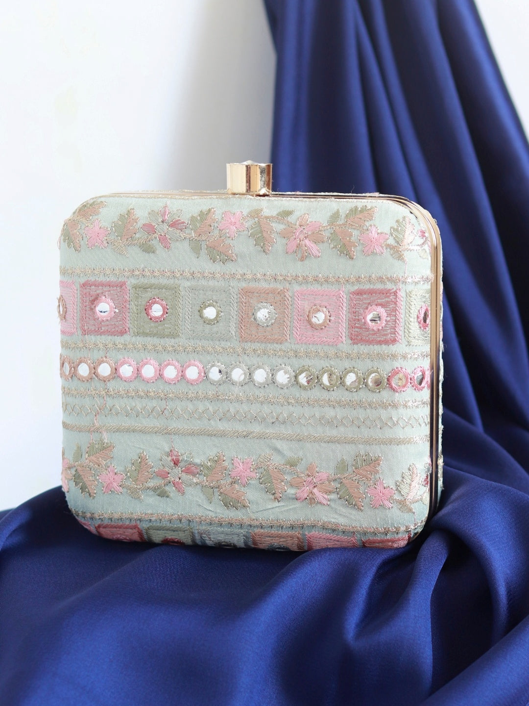 Pink floral Phulwaari box clutch by The Tan Clan with intricate embroidery and a compact, elegant design.