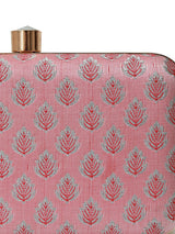 Pink box clutch purse by The Tan Clan featuring a classic rectangular design and elegant pink finish.