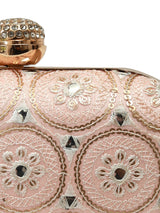Inaara Peach oval clutch purse by The Tan Clan, featuring a sleek design and elegant oval shape with a smooth peach finish.
