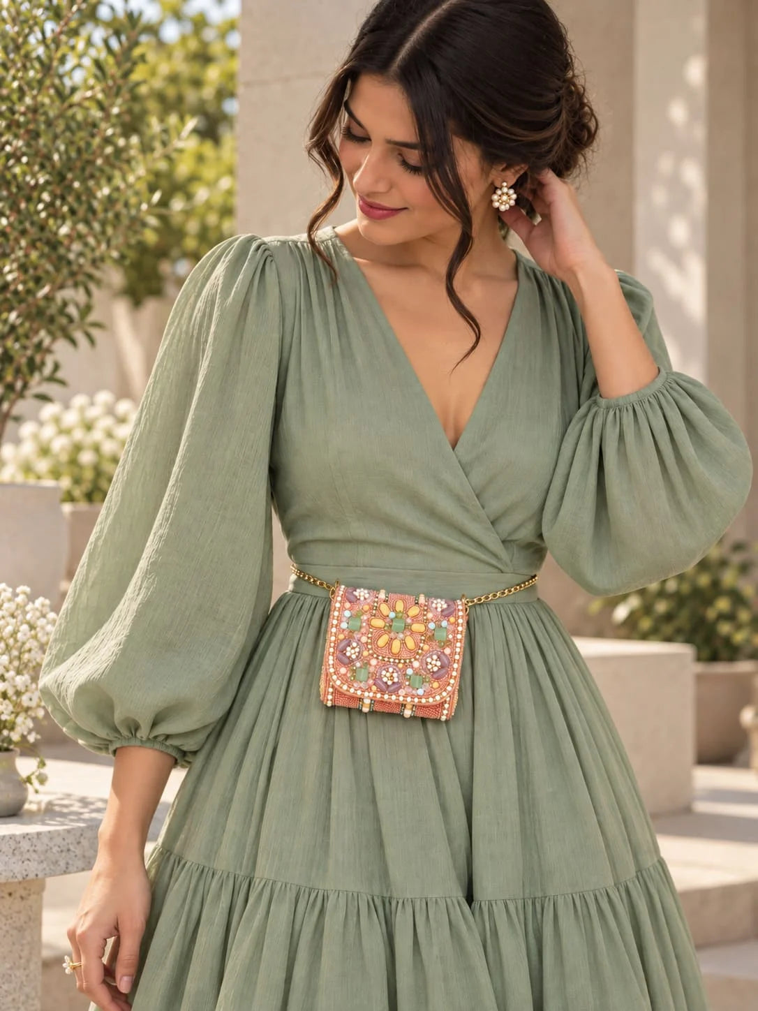 Basra Peach Hand Embroidered Mini Flap bag by THE TAN CLAN featuring intricate embroidery and a compact design.