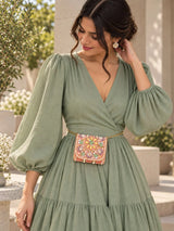 Basra Peach Hand Embroidered Mini Flap bag by THE TAN CLAN featuring intricate embroidery and a compact design.