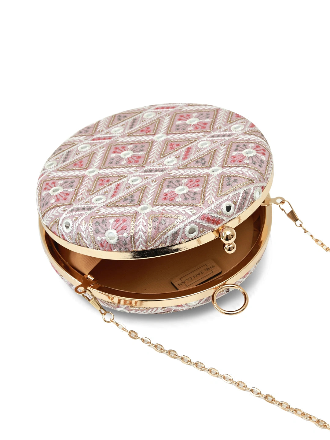 Pink round clutch bag from The Tan Clan's Ariba collection with a smooth, glossy finish and compact design.