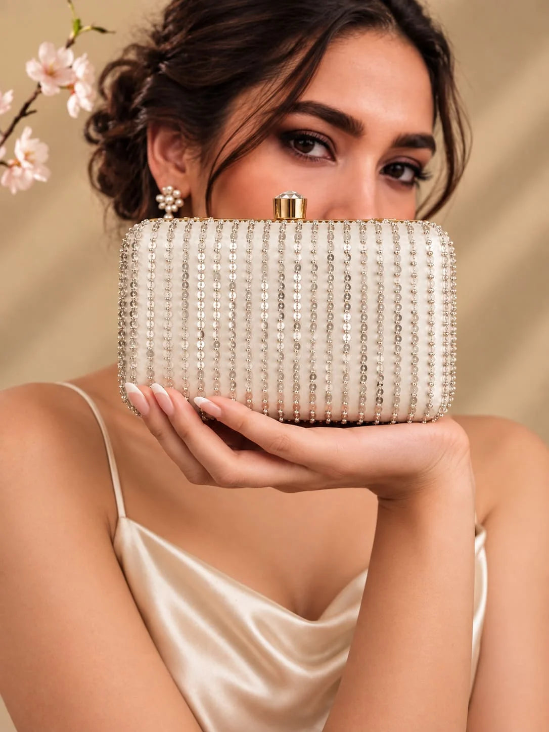 Silver embroidered box clutch by THE TAN CLAN featuring intricate Glitty detailing and a sleek, compact design for elegant occasions.