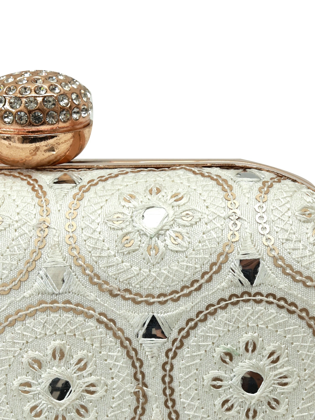 White oval clutch bag from The Tan Clan's Inaara collection, showcasing sleek design and elegant craftsmanship.