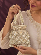 Rooh white sequined tasselled potli bag by THE TAN CLAN with intricate beadwork and a decorative tassel for festive occasions.