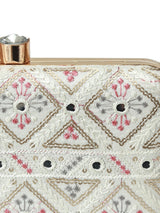 White box clutch by The Tan Clan, Ariba White Box Clutch, featuring a sleek rectangular design with a fold-over flap and minimalistic style.
