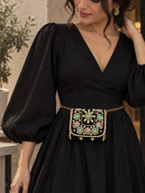 Black hand-embroidered mini flap bag by THE TAN CLAN, featuring intricate embroidery and compact design.