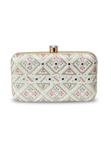 White box clutch by The Tan Clan with gold clasp and sleek design, perfect for elegant evening occasions.
